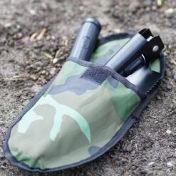 Merkloos Survival Schep - 7 In 1 - Opvouwbaar - 7 Delig - Met Draagtas - 16 Tot 41 Cm - Met Houweel - Pionierschep - Vouwschop - Handzame Schep - Schop - Outdoor - Kamperen - Camping - Multifunctionele Schep - Militaire Schop - Gereedschap -Bol 1200x1200 774